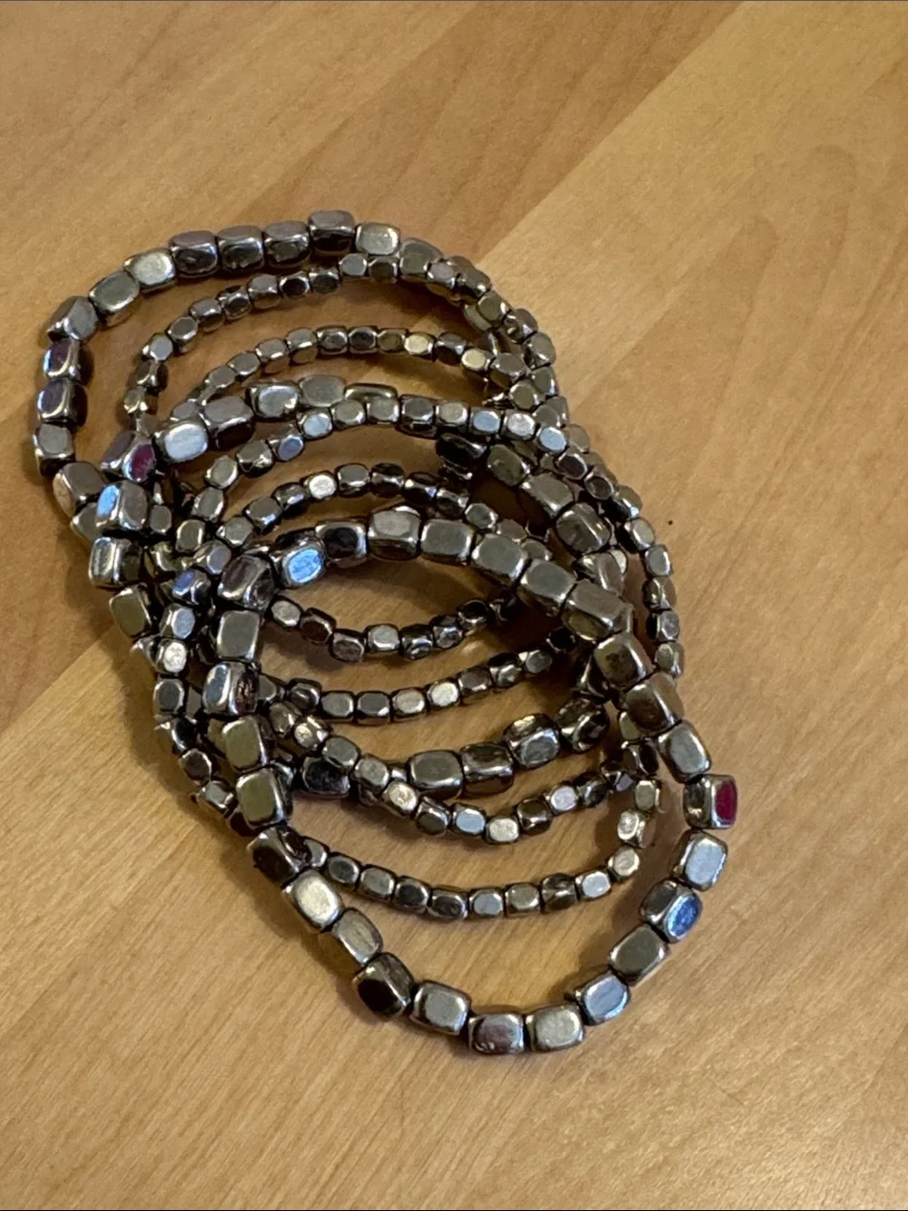 Chunky multi-strand, silver tone burnished nugget set of 7 bracelets